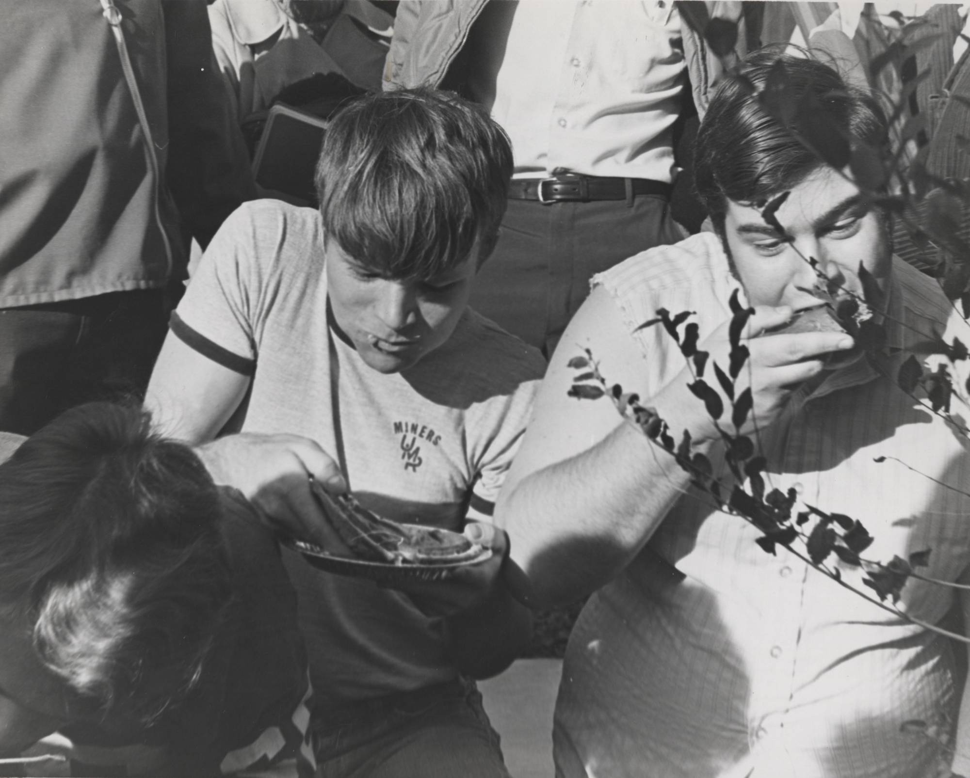 Students eating pie.